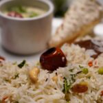 Close-up of Gujarati Vegetable Pulao highlighting aromatic spices and mixed vegetable textures