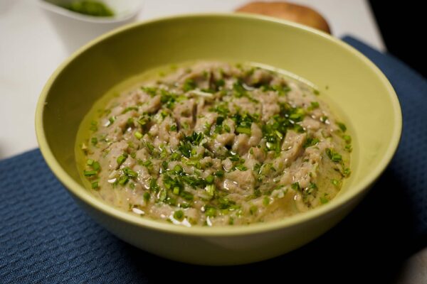 Close-up of spicy green garlic mashed potatoes with aromatic tempering